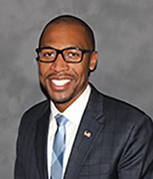 Headshot of Carlton Reeves. 
