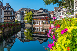 Buildings line a river