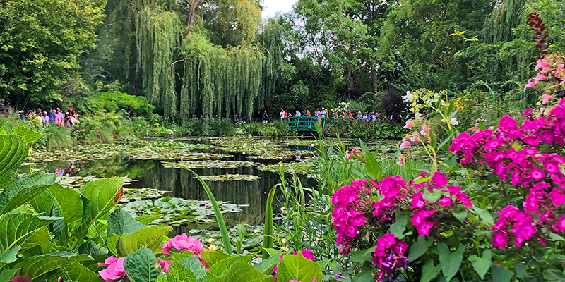 Monet’s Lily ponds at Giverny with floral and trees.